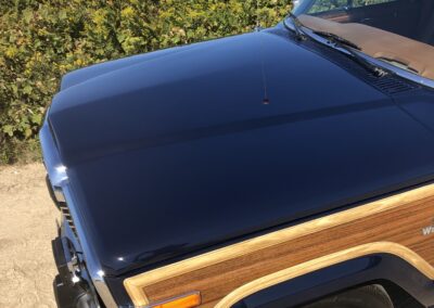 Closeup of a midnight blue Jeep hood