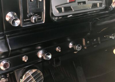 Closeup of dashboard controls in a vintage Jeep