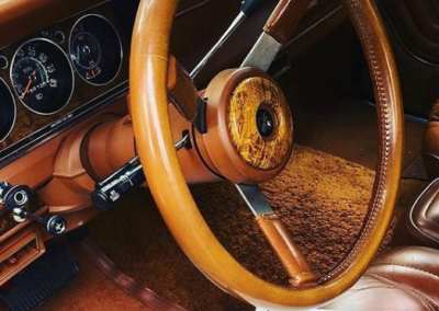 Vintage Jeep steering wheel in wood trim