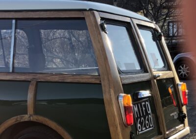 Rear of a Green classic Mini Traveller