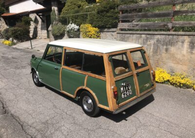 Rear view of a Green classic Mini Traveller