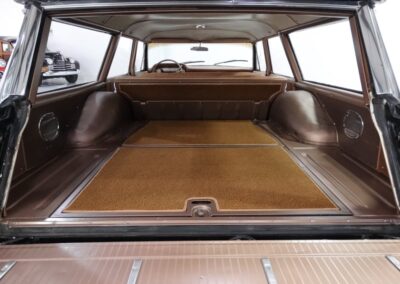 CLoseup of extra large open trunk of classic Ford station wagon