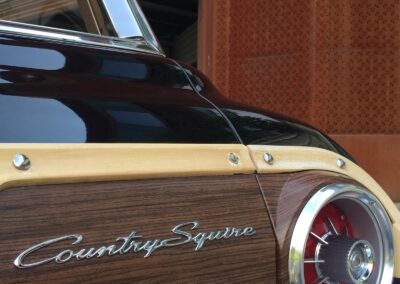 Closeup of Ford station wagon's Country Squire badge